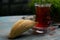 Azerbaijan pastry shekerbura with and glass of black tea