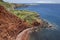 Azores coastline landscape with red cliffs in Topo. Sao Jorge