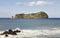 Azores coastline landscape with volcanic island. Ilheu da Vila.