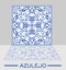 Azulejo original portuguese ceramic tile with mirror image on light gray background.