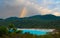 Azure bay and rainbow in Corsica, France
