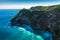 Azure beach with rocky mountains and clean sea water