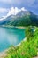 Azure mountain lake and high Alpine peaks, Austria