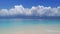The azure sea, white clouds and white sand. Indonesia, Gili Islands, Gili Meno