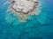 Azure water texture, transparent sea surface with a rocky bottom. Aerial view, Naxos,natural blue background