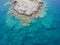 Azure water texture, transparent sea surface with a rocky bottom. Aerial view, Naxos,natural blue background,