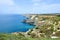 Azure water, wild beach, beautiful rocks and bay near Grape cape. Cape Fiolent, Sevastopol, Crimea