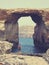 Azure Window on Gozo island, Malta, on a sunny summer day; faded, retro style