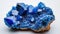 Azurite mesmerizing with its deep, celestial blue richness, contrasted on a white background