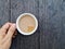 aâ€‹ cupâ€‹ ofâ€‹ Coffee, whiteâ€‹ cupâ€‹ onâ€‹ woodenâ€‹ table.