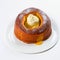 Baba au rhum French food over white background