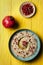 Baba ganoush or mutabal, Middle Eastern eggplant dip sauce garnished with pomegranate seeds