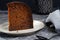 Baba Neagra, Black Baba, Traditional Moldavian Dessert on Dark Background