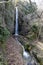 Babadag Yardan Waterfall. Yardan waterfall in mountain forest under blue sky. Babadag, Denizli, Turkey