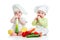 Babies boy and girl with vegetables