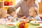 Babies eating healthy lunch in nursery