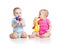 Babies girl and boy play musical toys