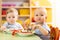 Babies have a lunch in nursery