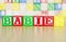 Babies Spelled Out in Alphabet Building Blocks