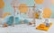 Baby activity gym play toys hanging from wooden arch on playmat in nursery or playroom. Home decoration children objects