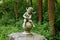 Baby angel or cupid figure made of stone in garden