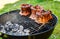 Baby Back Ribs Crown Roast on BBQ barbecue kettle grill