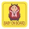 Baby on board sign. Girl with nipple fastened