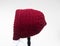 Baby bonnet knit berry color isolated