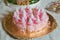 Baby bottle candy on the silver salver . Abstract of close view of infant milk bottle candy .