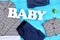 Baby-boy brand clothes background.