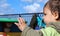 Baby boy olaying on playground