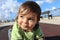 Baby boy olaying on playground