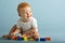 Baby Boy Playing With Building Blocks