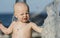 Baby Boy Plays in a Fountain in Mexico