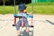 Baby boy on a swing on kids playground