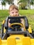 Baby boy on tractor