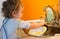 Baby boy washes plate