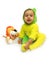 Baby boy in yellow fluffy funny suit sits with a toy