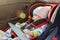Baby in the car, the concept of safe transportation of children in the car seat, seat belts
