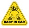 Baby in car sticker. Funny small face of girl.