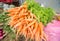 Baby carrots in streen market.