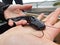 Baby catfish on the hand silurus glanis wels catfish black and white specimen in hand