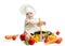 Baby chef toddler with healthy food