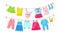 Baby clothes hanging on clothesline. Drying children`s clothes and accessories after washing on rope. Shorts, socks, romper,