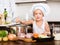 Baby cook prepared soup with vegetables