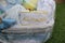 Baby cradle wrapped in a plastic gift bag with a nametag Alvaro on it