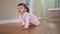 Baby crawling. Happy family a first steps kid dream concept. Baby newborn crawling down the hallway in the house. Happy