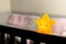 Baby crib with star lamp. Luminaire star concept.