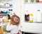 Baby. Cute. Girl. Refrigerator. Child. Kitchen