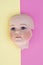 Baby Doll Head, Arms, Face Parts on Yellow and Pink Background